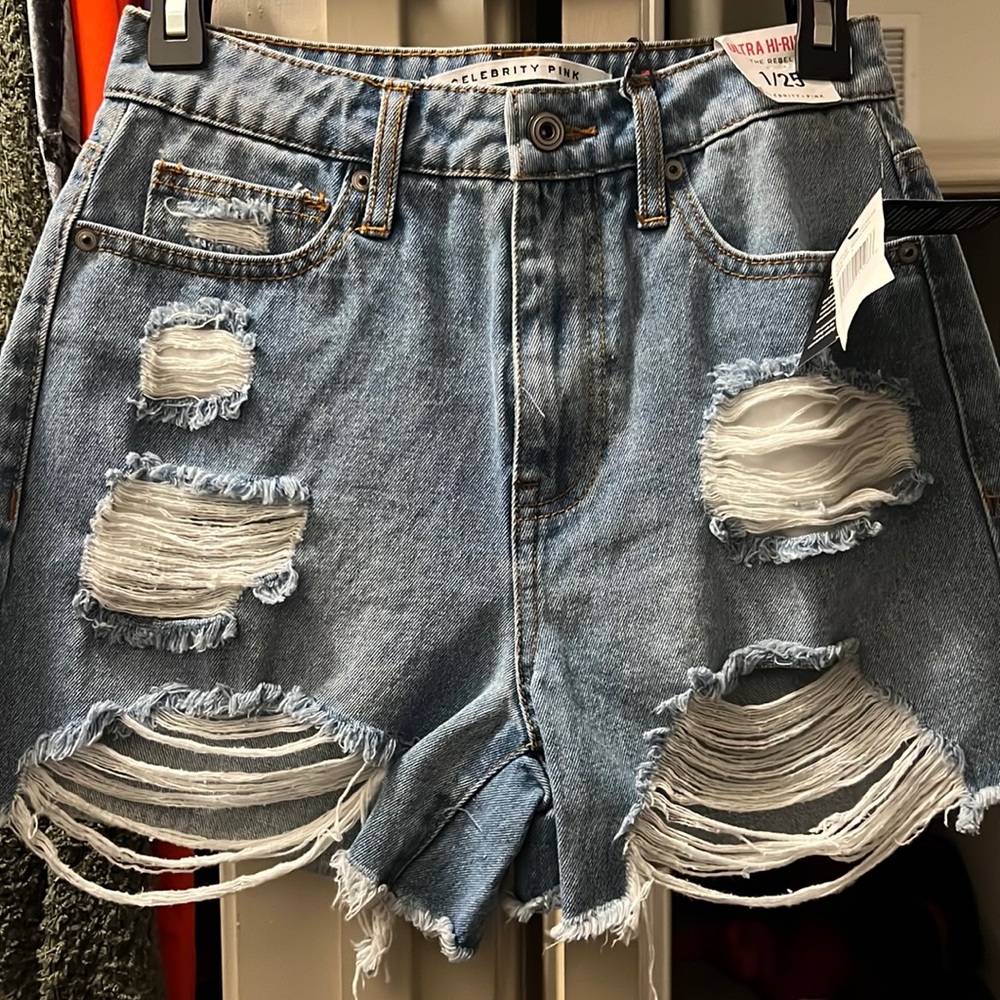 Light blue distressed denim shorts